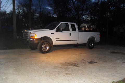 2000 Ford F-250 - This pickup truck appears to be from the late 1990s, likely a 1999 model, not a 2000.