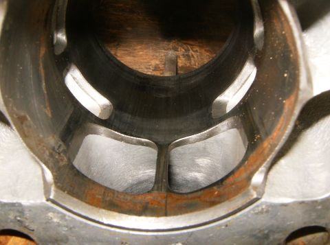 2000 Ford E350 - This is a close-up view of an engine cylinder, showing the ports for intake and exhaust.