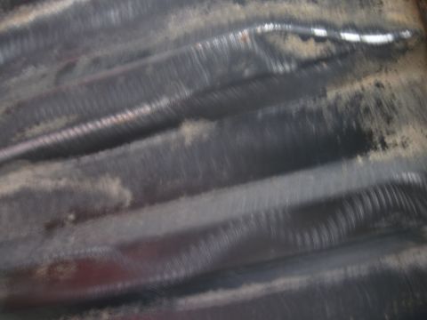 1979 Ford Bronco - Corrugated metal panel with Supermotors logo visible.