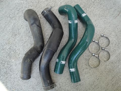1995 Ford Taurus - Set of automotive hoses and clamps, including two green silicone Samco Sport hoses.