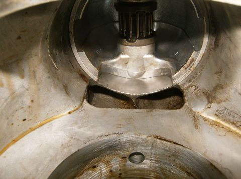 2000 Ford E350 - Internal view of a mechanical component, possibly from an engine, showing a splined shaft and metal housing.