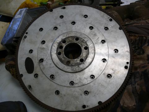 1976 Chevrolet Corvette - Flywheel part shown in detail, with a toothed outer edge and multiple bolt holes.