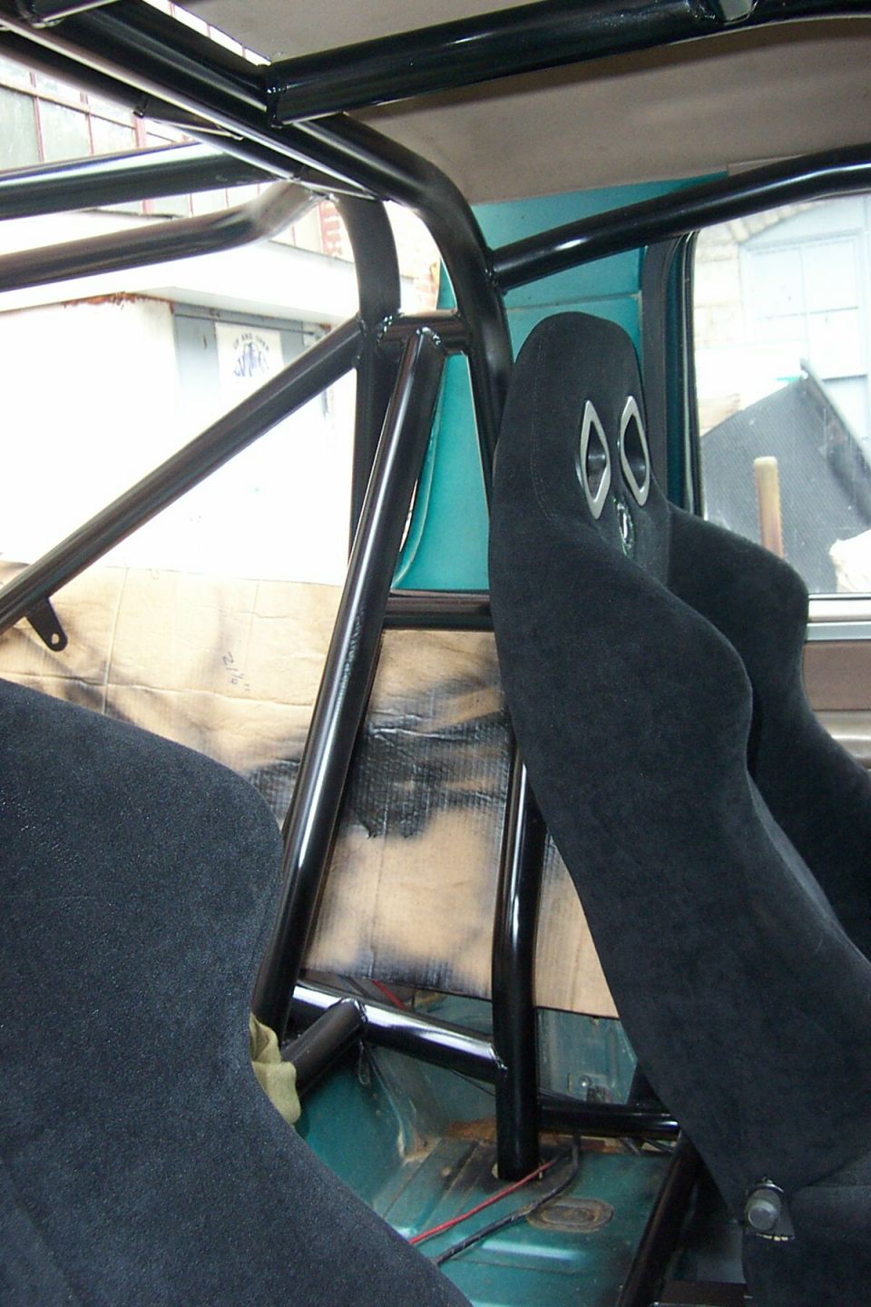 Behind Driver Seat