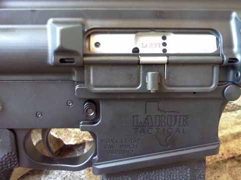 1996 Ford Bronco - Close-up view of a LaRue Tactical AR-15 style rifle lower receiver.