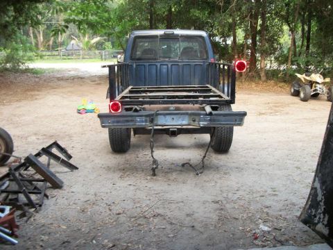 1994 Ford Explorer - This Ford pickup truck appears to be undergoing some modifications or repairs, with its bed removed.
