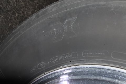 2003 Ford F-350 - Tire sidewall shows "GREEN X" logo and DOT code with 0103 date stamp.