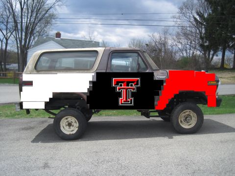 1979 Ford Bronco - This SUV features a large Texas Tech logo on its side, with a red front fender and white rear quarter panel.