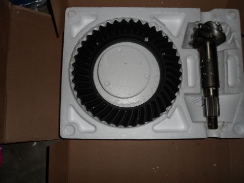 1991 Ford Bronco - A new differential gear set, including a ring gear and pinion, is shown packaged for shipping.