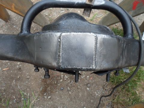 1991 Ford Bronco - Close-up of a rear axle differential housing, showing extensive welding on the casing.