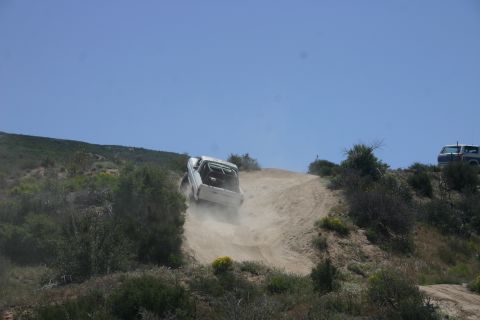 1991 Ford Bronco - Off-roading in Cleghorn, 1991 Ford Bronco tackling a steep dirt incline.
