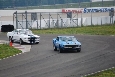 2007 Ford Mustang - Two classic Mustangs compete on the Nashville Superspeedway circuit.
