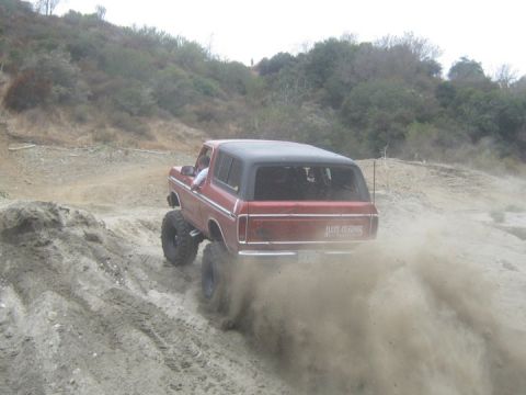 1978 Ford Bronco - This 1978 Ford Bronco is shown off-roading on a dusty trail.