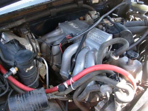 1995 Ford F-150 - After a little driving, it became apparent that there was a serious oil leak dripping onto the rear Y-pipe from the intake heat shield. For…