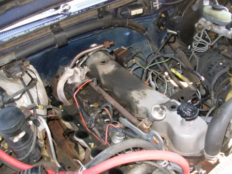 1995 Ford F-150 - This is after removing the throttle cover, the PCV & breather hose from their grommets, all the vacuum lines from the tree, the intake hose…
