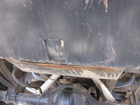 1971 Ford Bronco - The underside of a vehicle is visible, the rear axle and suspension components, along with a SuperMotors watermark.