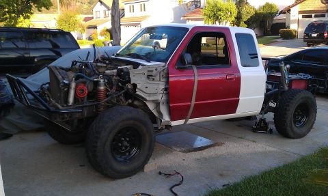 1992 Ford Ranger - This truck is undergoing modifications with its front end disassembled and engine visible.