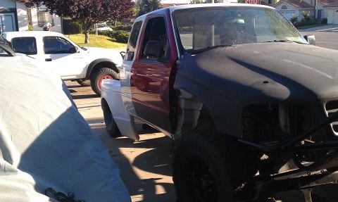 1992 Ford Ranger - This custom pickup truck appears to be undergoing modifications, with a mix of body colors and an incomplete front section.