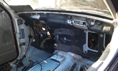 1992 Ford Ranger - The interior of a 1992 Ford Ranger shows a disassembled dashboard with exposed components and wiring.
