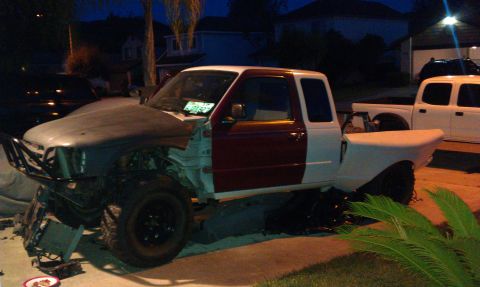 1992 Ford Ranger - This truck is in a state of repair with mismatched body panels and missing front-end components.