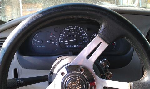 1992 Ford Ranger - Interior view of a 1992 Ford Ranger, displaying the steering wheel and instrument cluster.