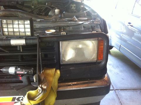 1990 Ford Bronco - Front view of a 1990 Ford Bronco, showing the bull bar and headlight assembly.