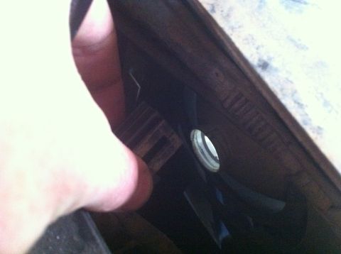 1990 Ford Bronco - A finger is visible in the foreground, partially covering a fan shroud.