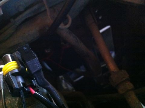 1990 Ford Bronco - Detail of electrical wiring and connectors, likely part of a vehicle's lighting system.