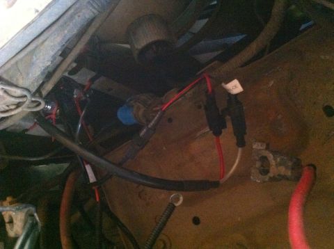 1990 Ford Bronco - Close-up view of vehicle wiring and a battery terminal, with "SUPERMOTORS.NET" visible at the bottom right.