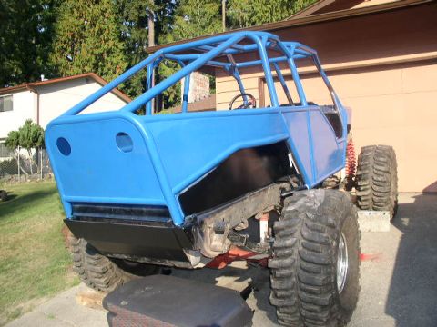1979 Ford Bronco - This custom-built buggy features a prominent blue roll cage and oversized off-road tires.