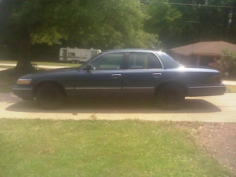 1997 Mercury Grand Marquis - Repainted the Steel Rims for Beauty Rings and Lug Cap