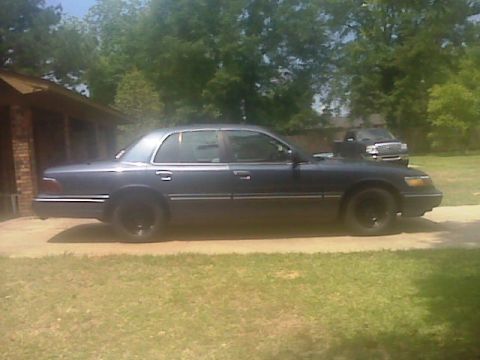 1997 Mercury Grand Marquis - Repainted the Steel Rims for Beauty Rings and lug caps