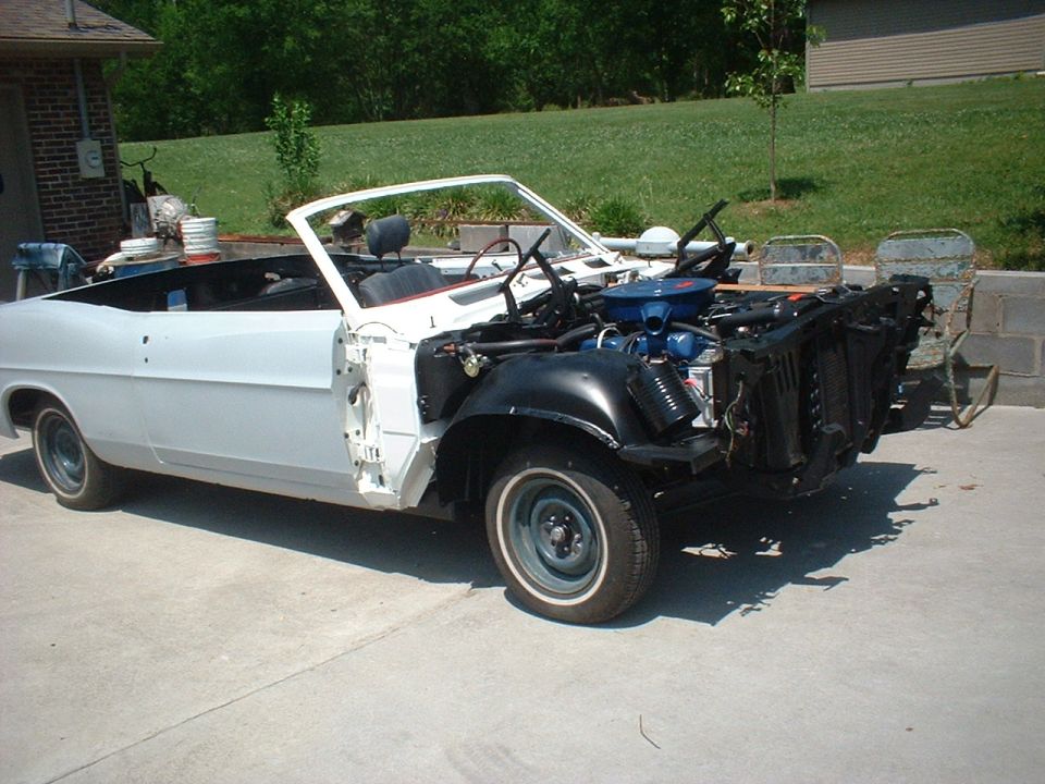 1967 Ford Galaxie convertible with front end removed, undergoing restoration