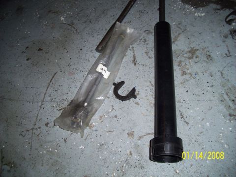 1995 Ford Probe - Various car parts are laid out on a concrete surface, with a date stamp of 01/14/2008 visible.