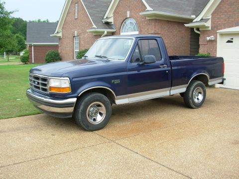 1995 Ford F-150 - I found some black center caps in my junkpile which are correct, but rare. I'd rather put red ones on it, but I haven't found any at the ju…