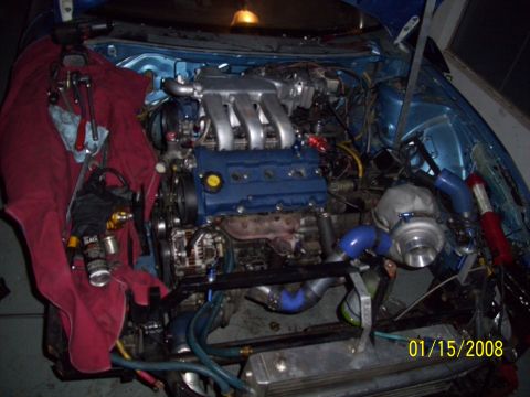 1995 Ford Probe - Engine bay with a turbocharger and various modifications, dated 01/15/2008.
