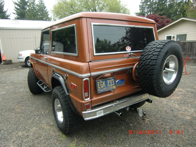 Brown 1973 Ford Bronco with spare tire on rear, Oregon license plate EGK 233