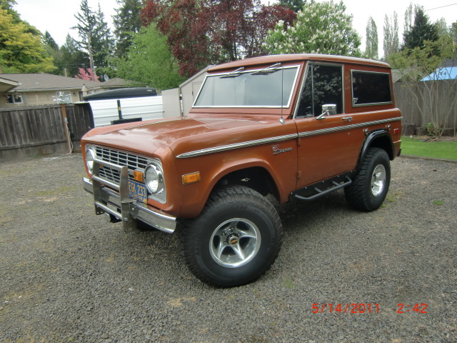 Orange 1973 Ford Bronco 3/4 front view