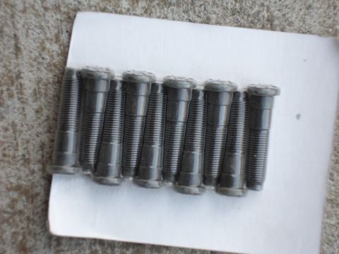 1991 Ford Bronco - A set of lug studs is displayed on a white backing card.