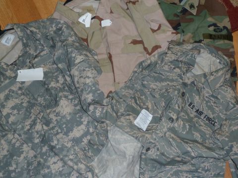1992 Ford Mustang - Collection of military uniforms from different branches and camouflage patterns.
