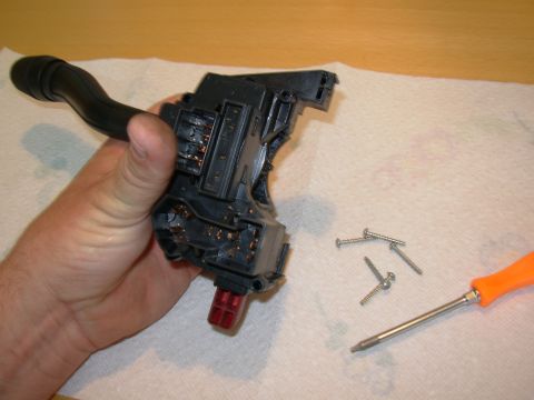 1983 Ford Bronco - Hold the case together firmly as the screws are removed. The springs are near the hazard button, so take those screws out last. Push the le…
