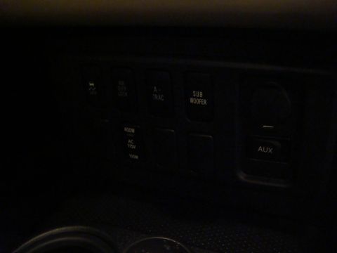 2010 Toyota FJ Cruiser - Interior dashboard controls include options for traction, audio, and power outlets.