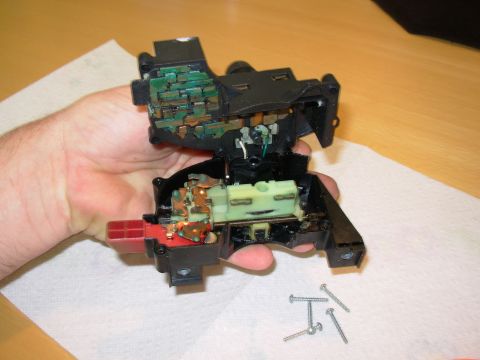 1983 Ford Bronco - The parts will be loose as soon as the case separates, so hold it this way. Sliding the top slightly toward center will disengage the beam…