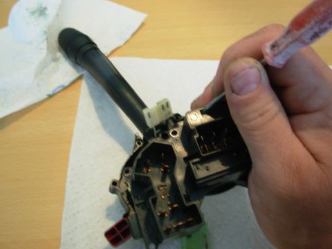 1983 Ford Bronco - While splitting the case, release the catch on the wiper connector using a fine flat screwdriver or probe through this access hole. It will…