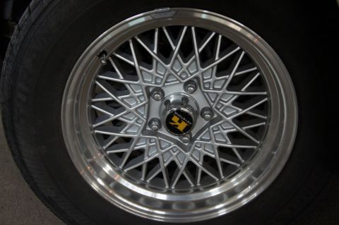 2000 Mercury Grand Marquis - A Keystone wire wheel is shown mounted on a tire.