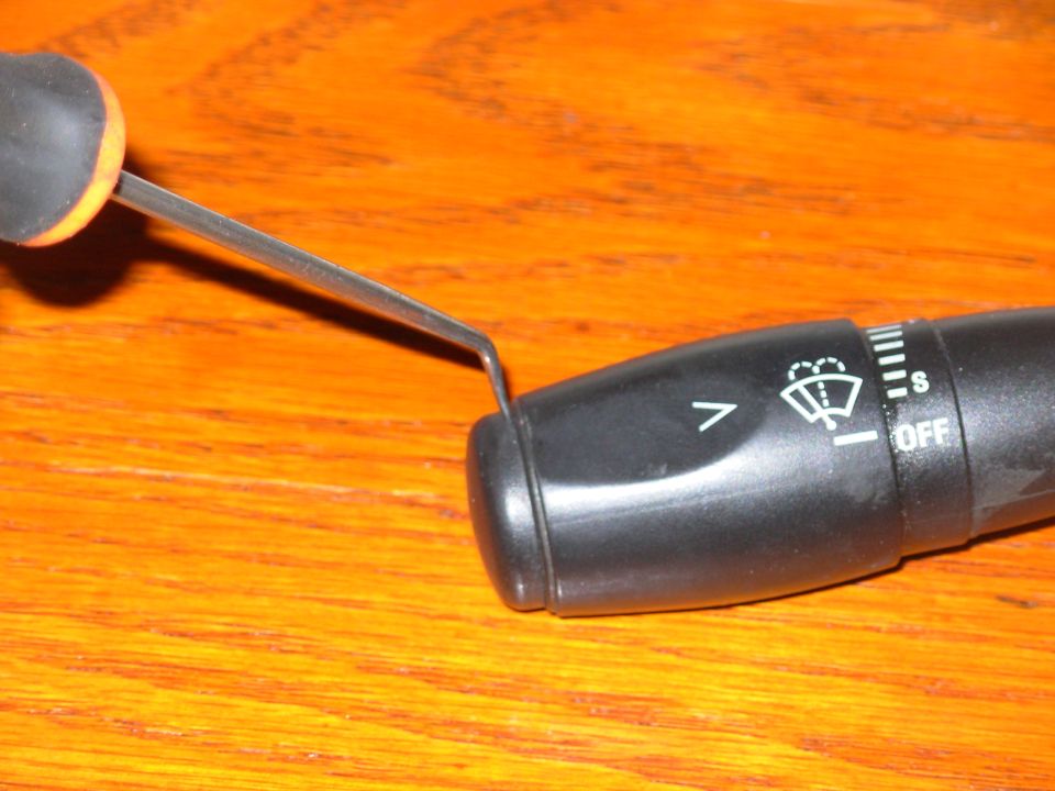 To clean the wiper switch, it's not necessary to remove the MFS from the column.  Just pop the cap off the end.