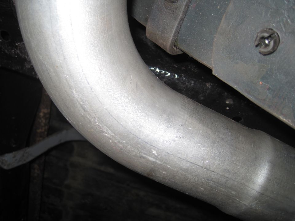 Exhaust pipe section with Supermotors.net logo