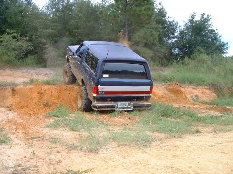 1995 Ford Bronco - This 1995 Ford Bronco navigates a challenging dirt incline.