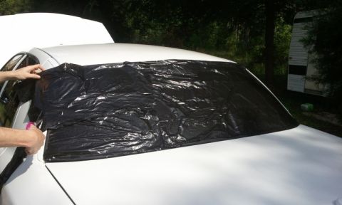 1998 Ford Crown Victoria - cut out trash bag the shape of rear window