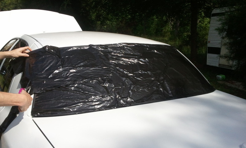cut out trash bag the shape of rear window