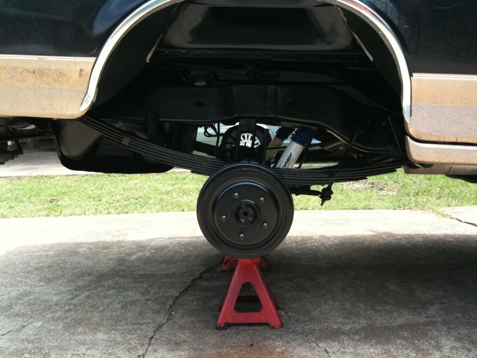 Rear axle and suspension of a 1996 Ford Bronco on jack stands